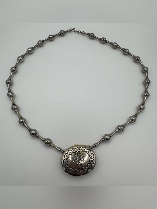 Estee Lauder Jewelry - Vintage 1973 Estee Lauder Moonsilver Solid
Perfume Necklace Full Locket Pendant